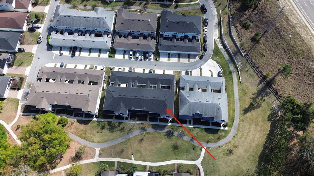 2222 Gopher Tortoise Terrace Oakland, FL 34787 - Photo 47 of 51 an aerial view of multi story residential apartment building with outdoor space