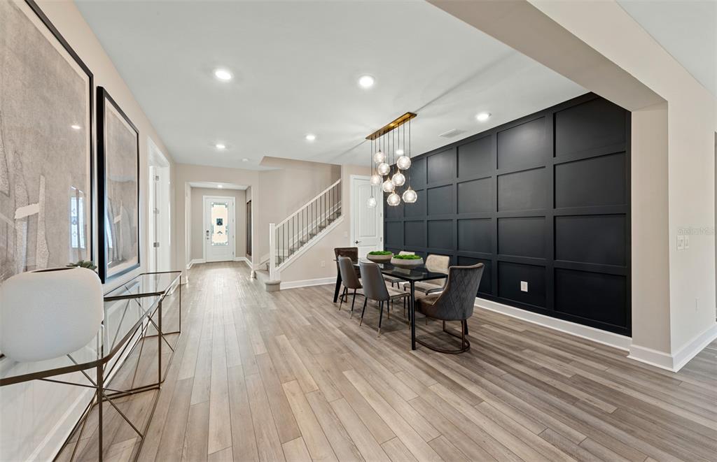 16427 Sapphire Point Drive Lakewood Ranch, FL 34211 - Photo 11 of 30 a view of a livingroom with furniture and wooden floor