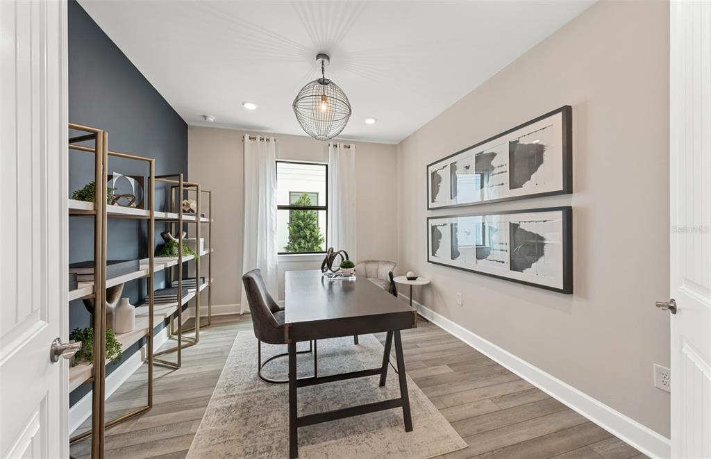 16427 Sapphire Point Drive Lakewood Ranch, FL 34211 - Photo 13 of 30 a workspace with wooden floor and windows