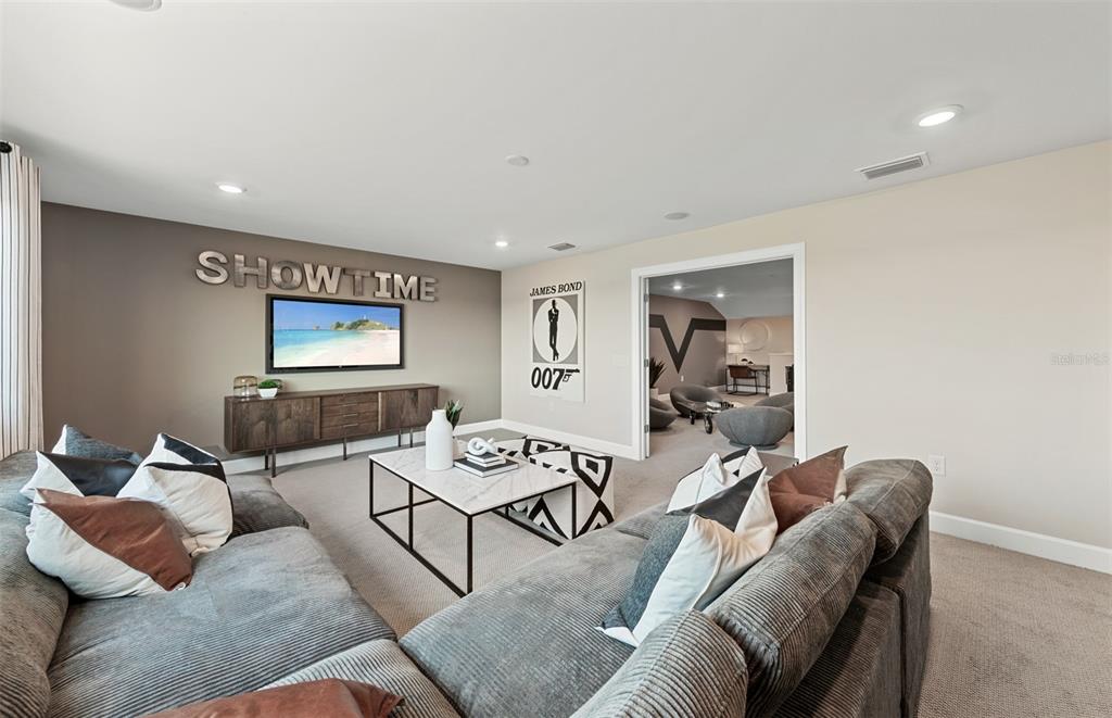 16427 Sapphire Point Drive Lakewood Ranch, FL 34211 - Photo 16 of 30 a living room with furniture and wooden floor