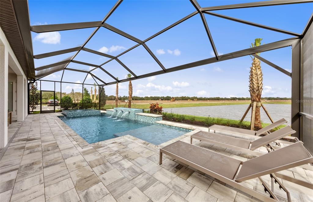 16427 Sapphire Point Drive Lakewood Ranch, FL 34211 - Photo 29 of 30 a view of a patio with a lake view