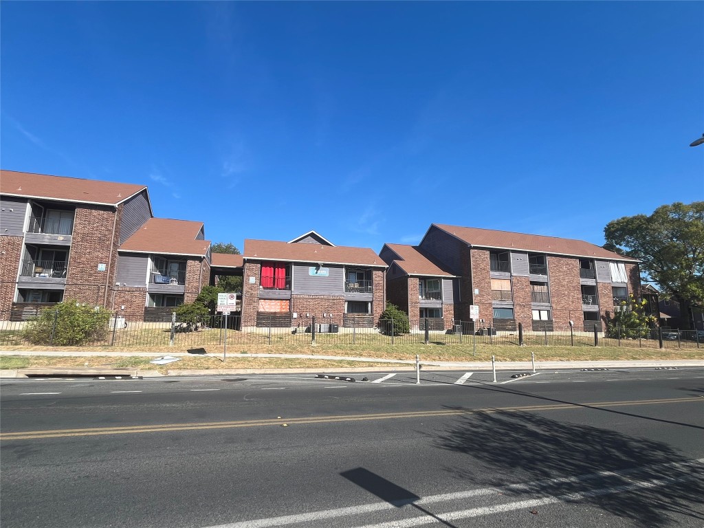 1840 Burton Drive, Unit 184 Austin, TX 78741 - Photo 16 of 23 View of building exterior