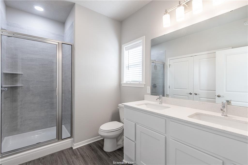 1326 Prairie Drive, Unit 623 Bryan, TX 77803 - Photo 16 of 21 a bathroom with a sink toilet and shower