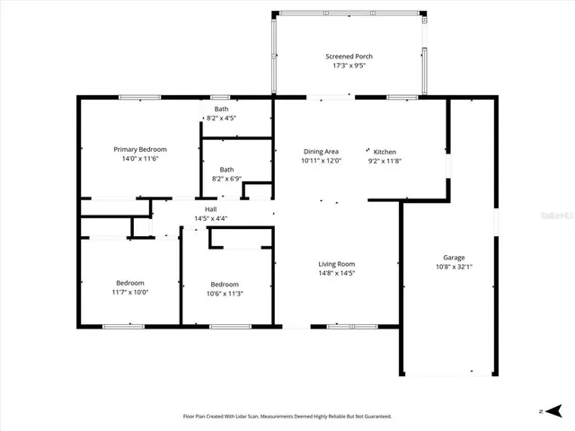 a view of a house with a tree in front
