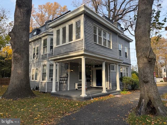 117 East Walnut Avenue, Unit F Merchantville, NJ 08109 - Photo 17 of 19 front view of a house with a yard