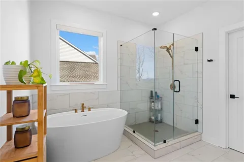 a bathroom with a shower and a toilet