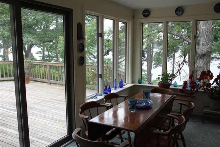 62 Turning Mill Road Brewster, MA 02631 - Photo 12 of 27 a dining room with furniture and window