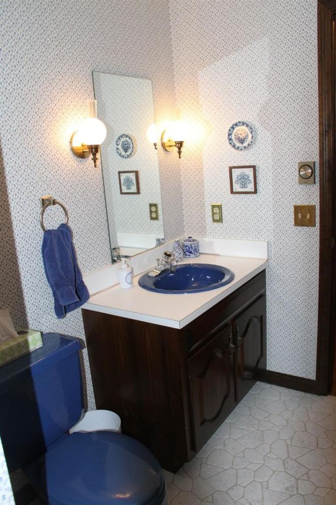 62 Turning Mill Road Brewster, MA 02631 - Photo 20 of 27 a bathroom with a sink and a mirror