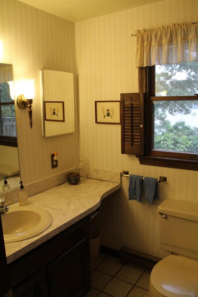 62 Turning Mill Road Brewster, MA 02631 - Photo 23 of 27 a bathroom with a sink and a toilet
