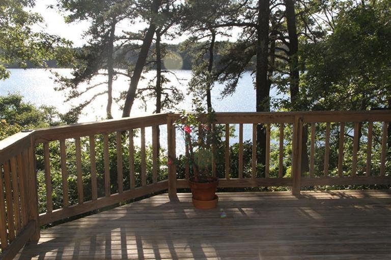 62 Turning Mill Road Brewster, MA 02631 - Photo 5 of 27 a view of a house with a yard from a balcony