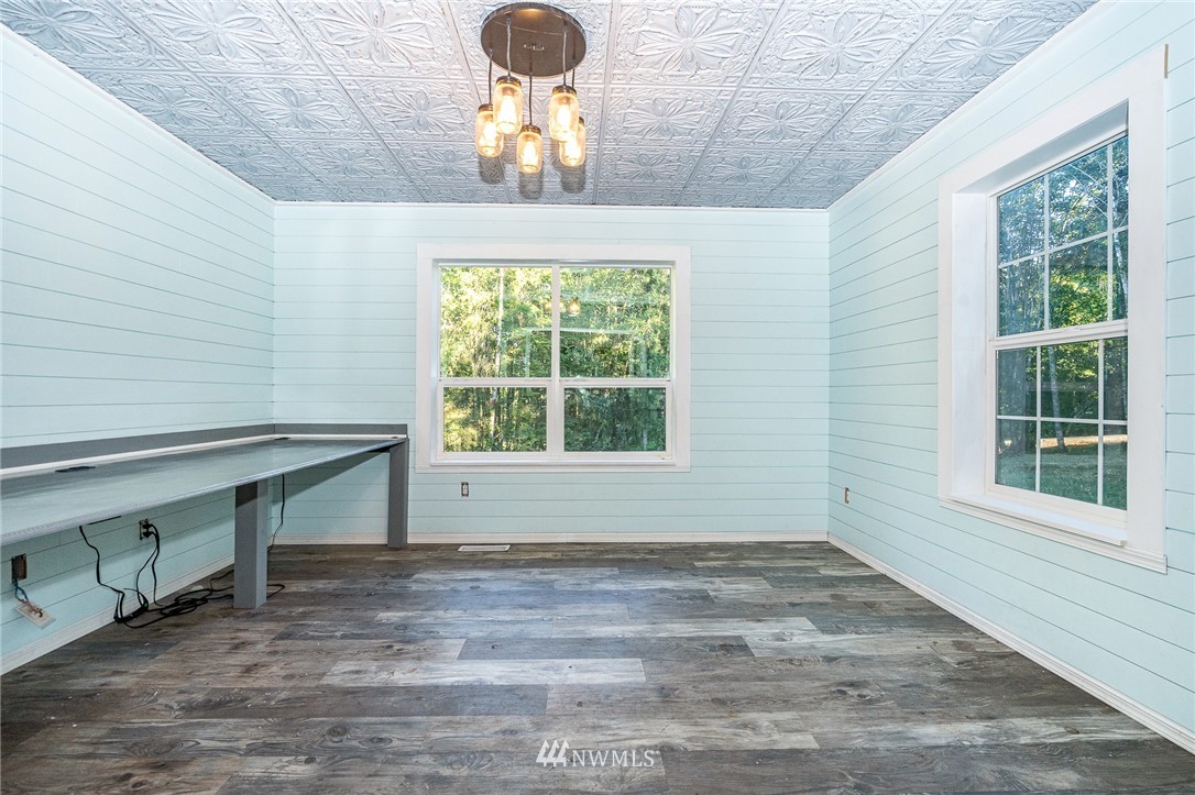 222 Crego Ridge Road Chehalis, WA 98532 - Photo 14 of 40 a view of room with window and wooden floor
