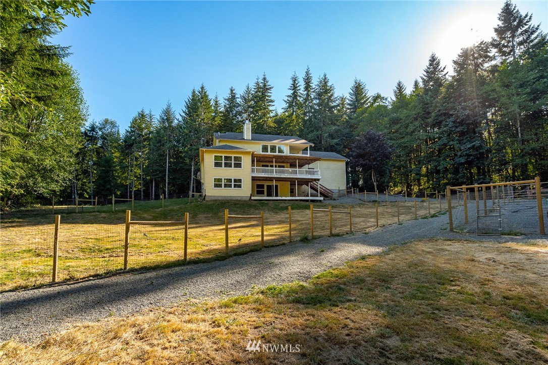 222 Crego Ridge Road Chehalis, WA 98532 - Photo 4 of 40 a view of a house with a yard