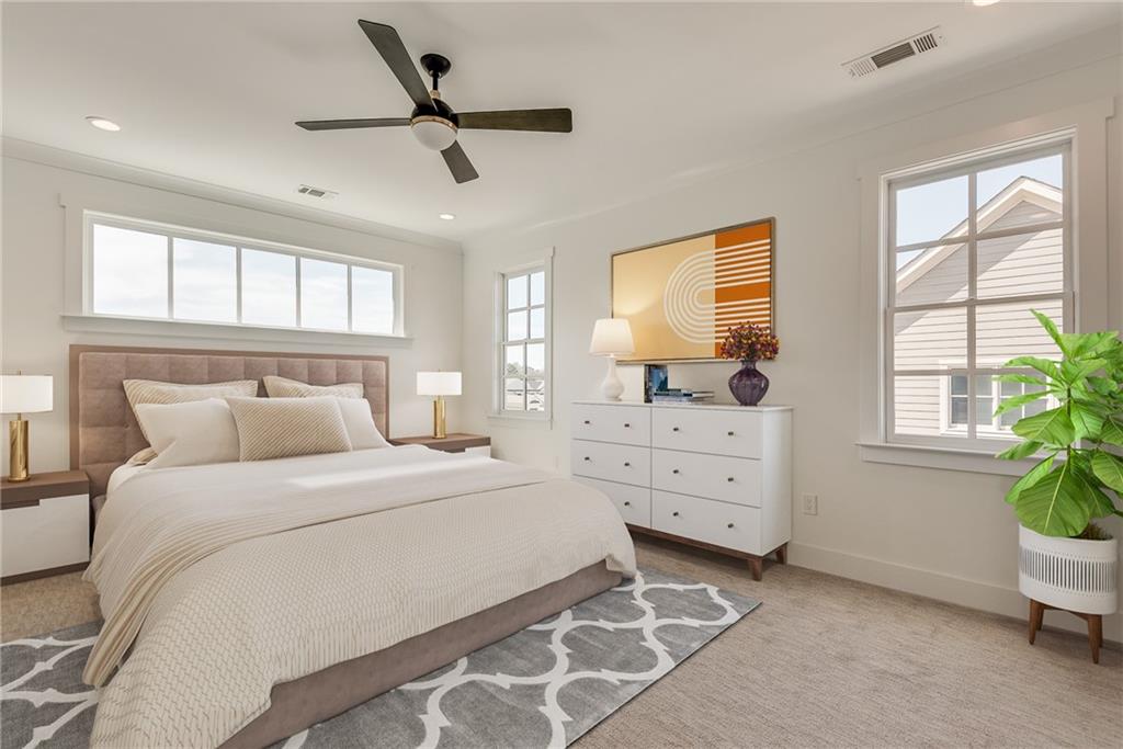 5914 Redwine Street Norcross, GA 30071 - Photo 1 of 1 a bedroom with a bed a window and potted plant