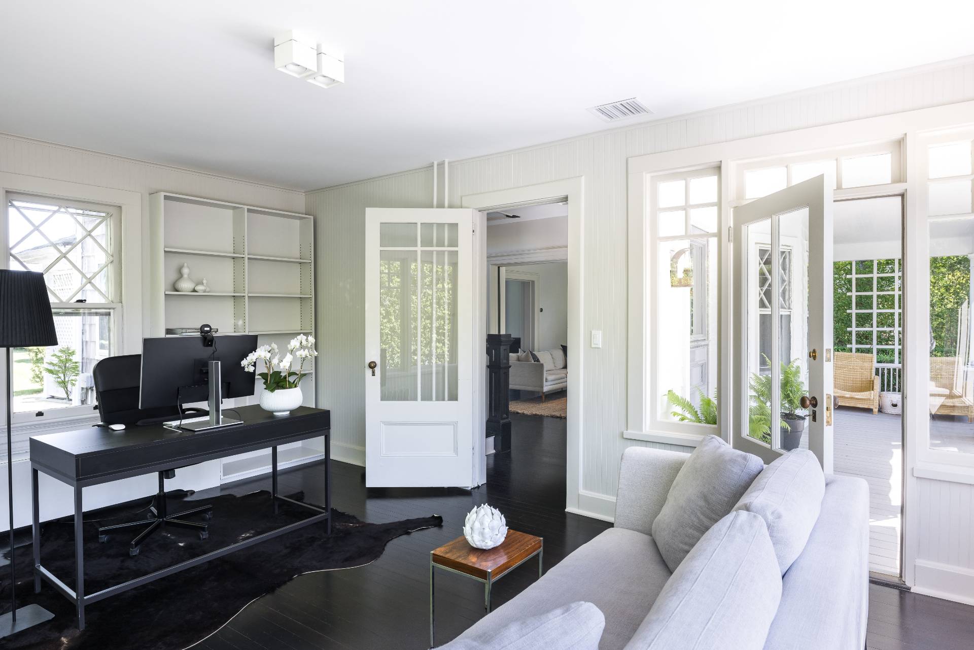 196 Maple Lane Bridgehampton, NY 11932 - Photo 14 of 25 a living room with furniture and a floor to ceiling window