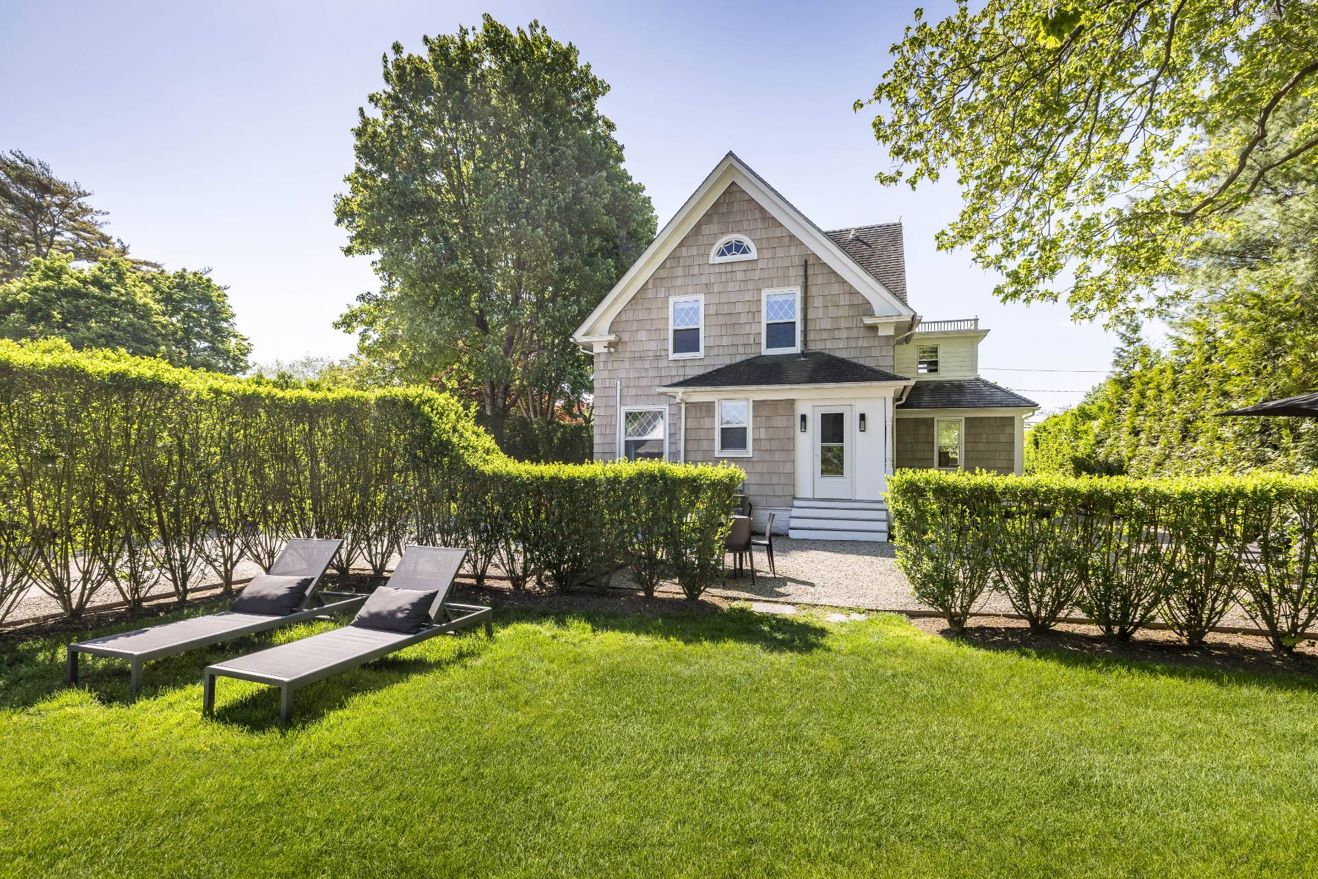 196 Maple Lane Bridgehampton, NY 11932 - Photo 6 of 25 a aerial view of a house with swimming pool next to a yard