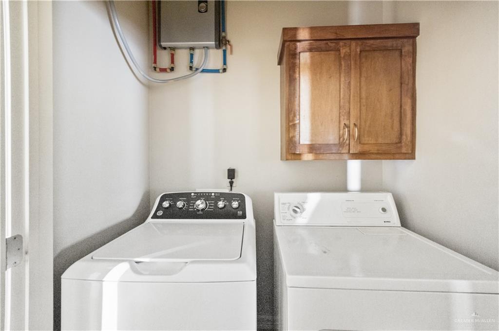 2715 Mimosa Street, Unit 2 Mission, TX 78574 - Photo 7 of 13 a utility room with dryer and washer
