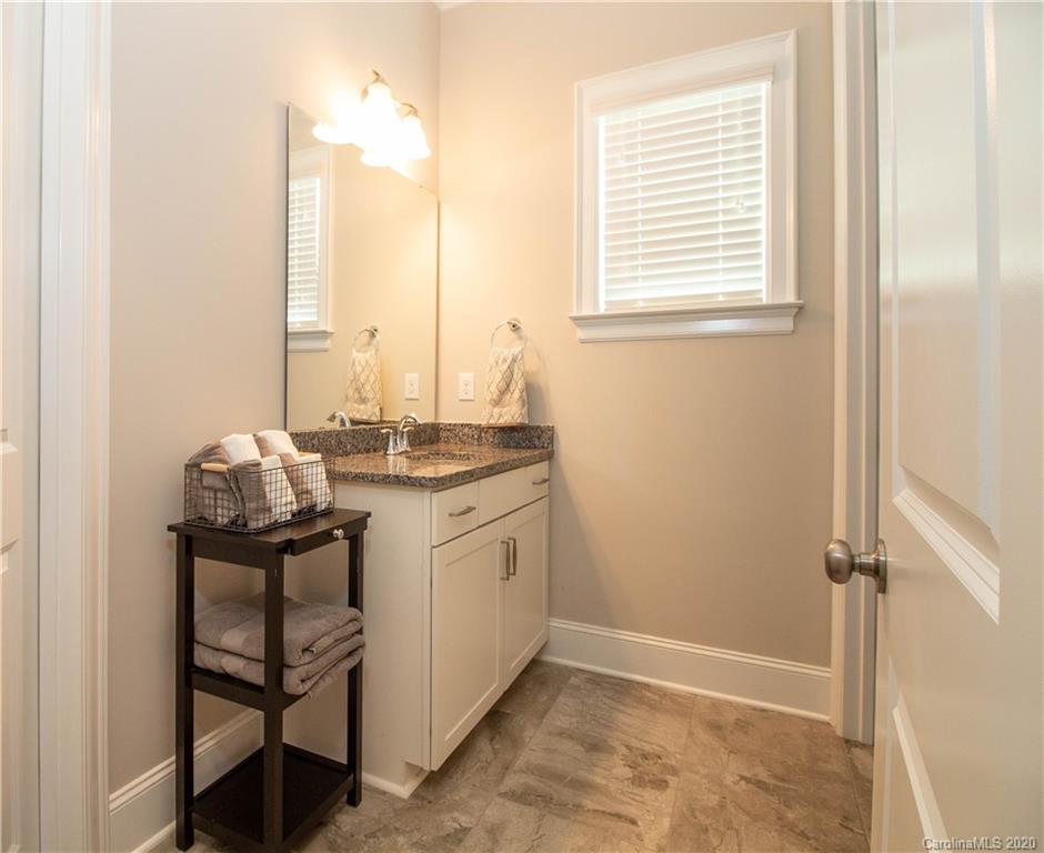 1428 Afton Way Fort Mill, SC 29708 - Photo 14 of 40 a bathroom with a sink vanity and a mirror