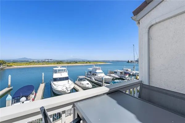 a view of roof deck with furniture