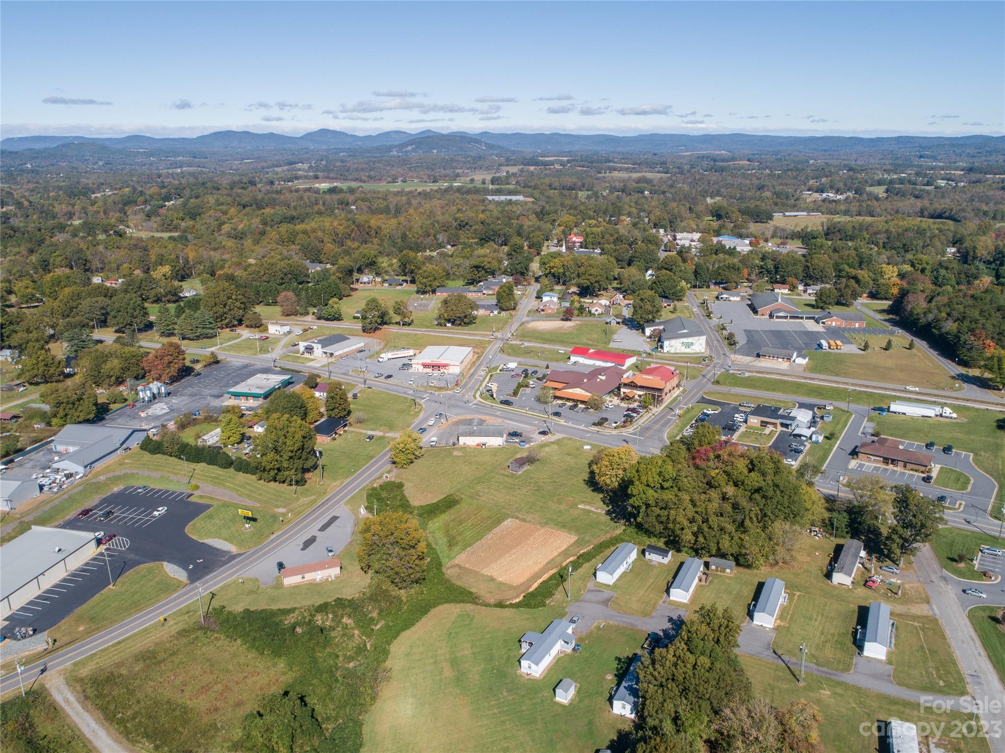 5090 Highway 90 Hiddenite, NC 28636 - Photo 13 of 17 an aerial view of residential houses with outdoor space