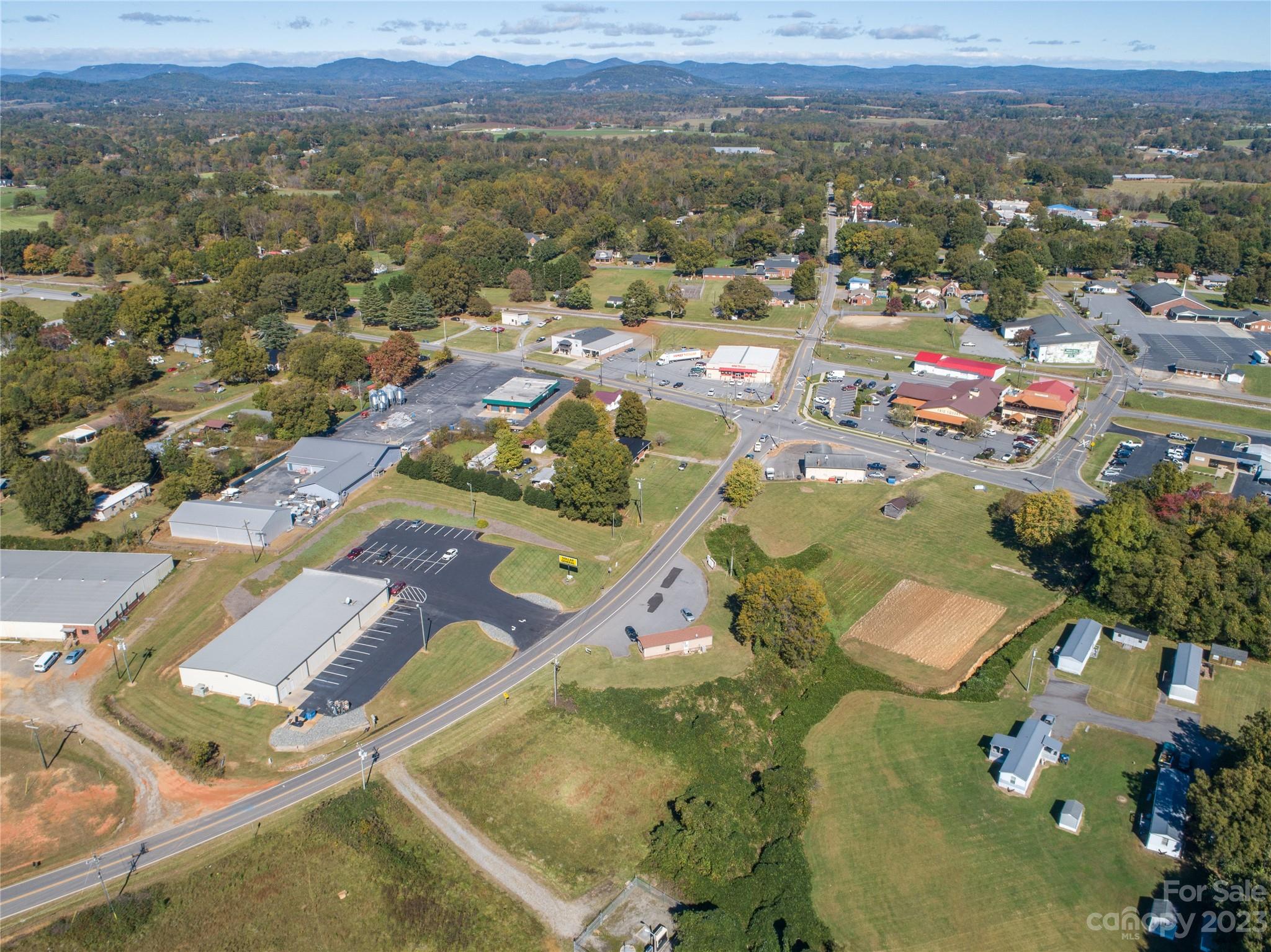 5090 Highway 90 Hiddenite, NC 28636 - Photo 14 of 17 an aerial view of residential houses with outdoor space