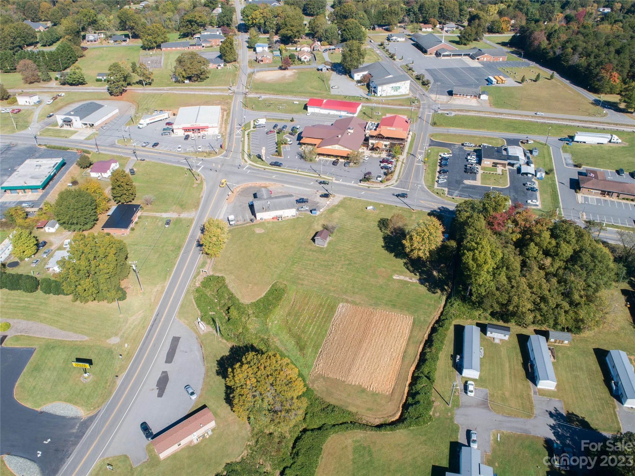 5090 Highway 90 Hiddenite, NC 28636 - Photo 4 of 17 an aerial view of residential houses with outdoor space