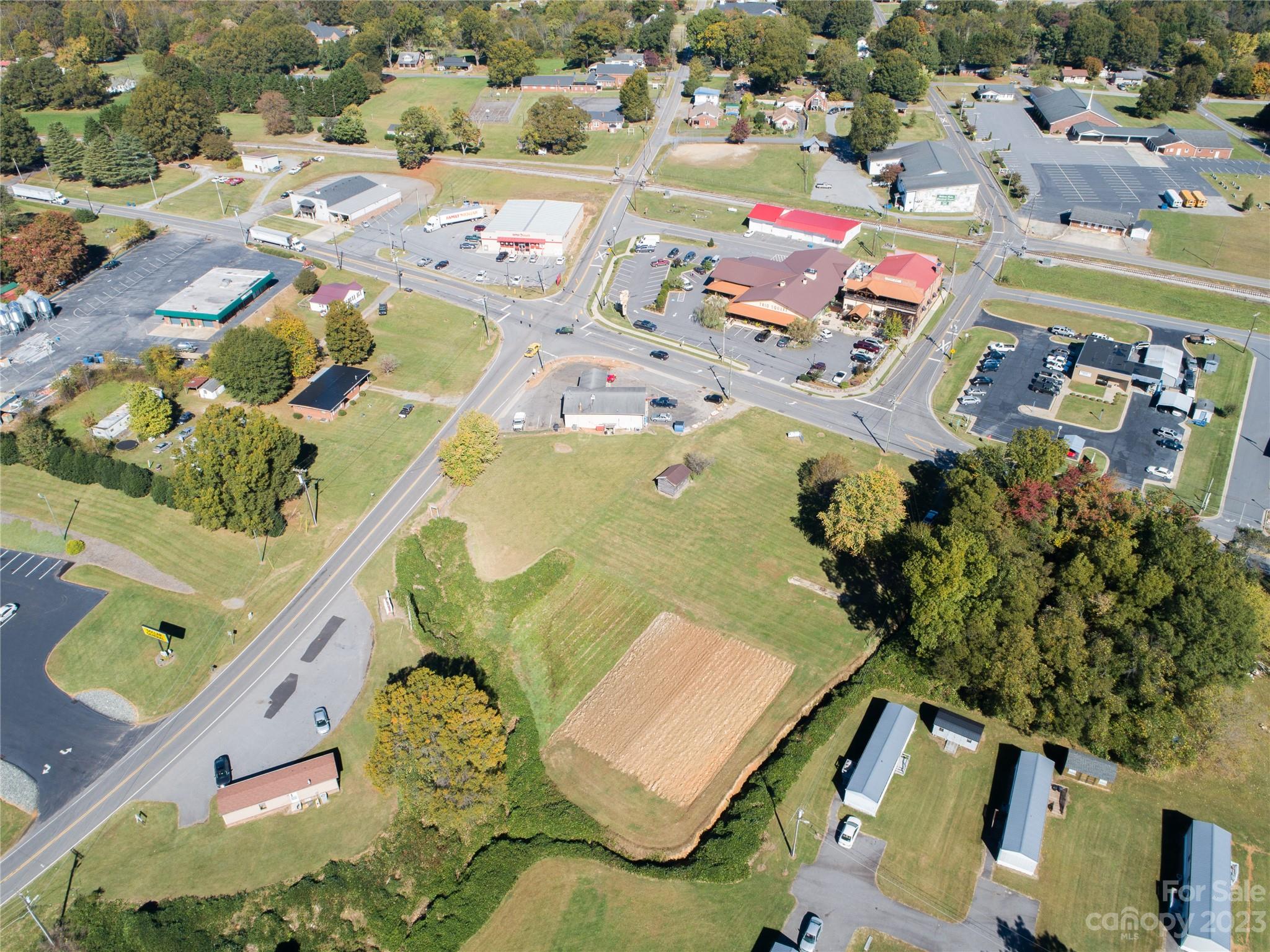 5090 Highway 90 Hiddenite, NC 28636 - Photo 5 of 17 an aerial view of residential houses with outdoor space
