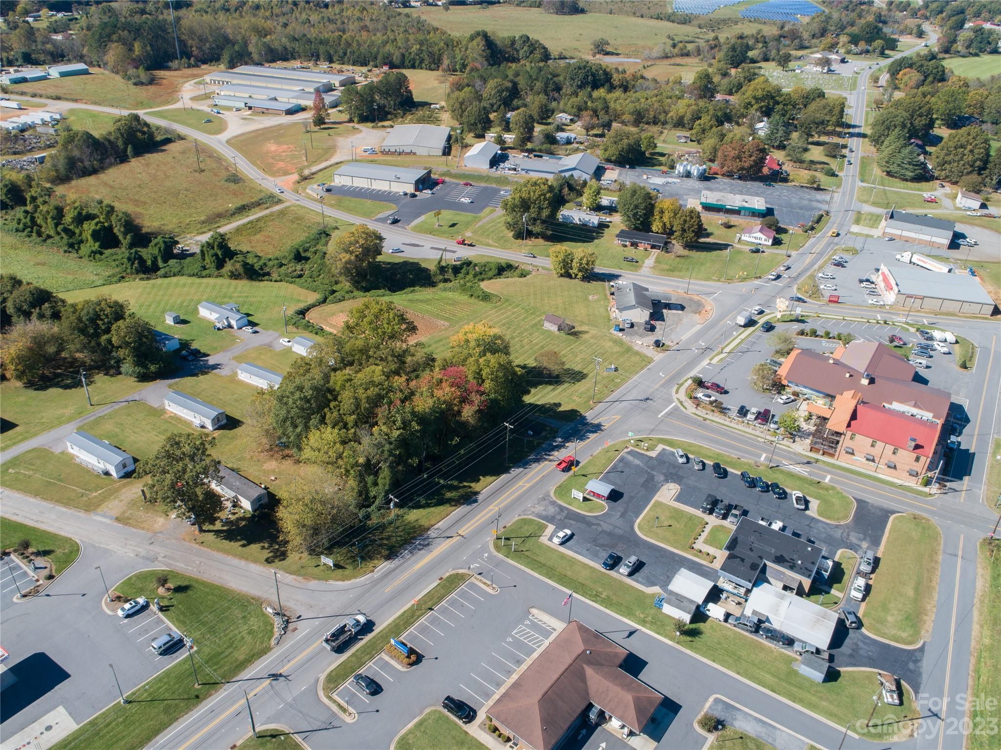 5090 Highway 90 Hiddenite, NC 28636 - Photo 8 of 17 an aerial view of a city