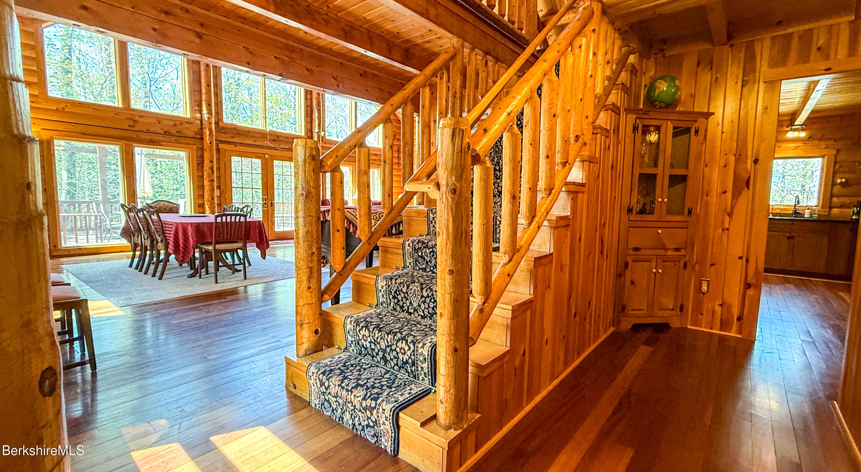 233 Algerie Road Becket, MA 01223 - Photo 7 of 48 a living room with furniture and wooden floor