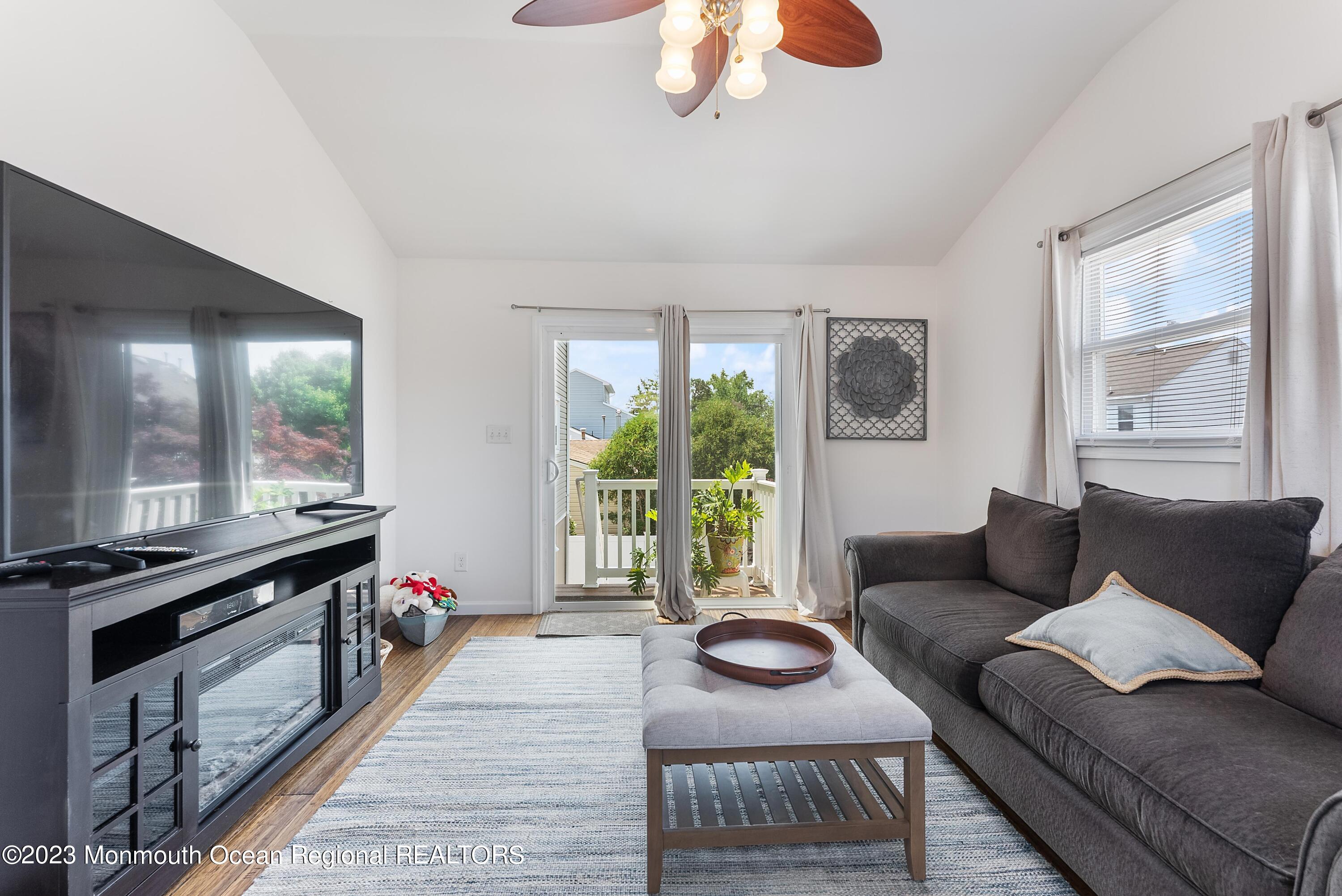 16 Brookfield Drive Brick, NJ 08723 - Photo 13 of 37 a living room with furniture and a large window