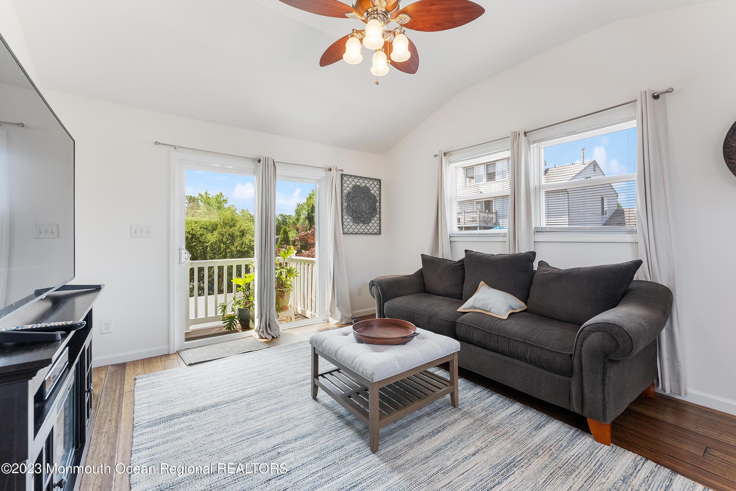 16 Brookfield Drive Brick, NJ 08723 - Photo 14 of 37 a living room with furniture and a large window