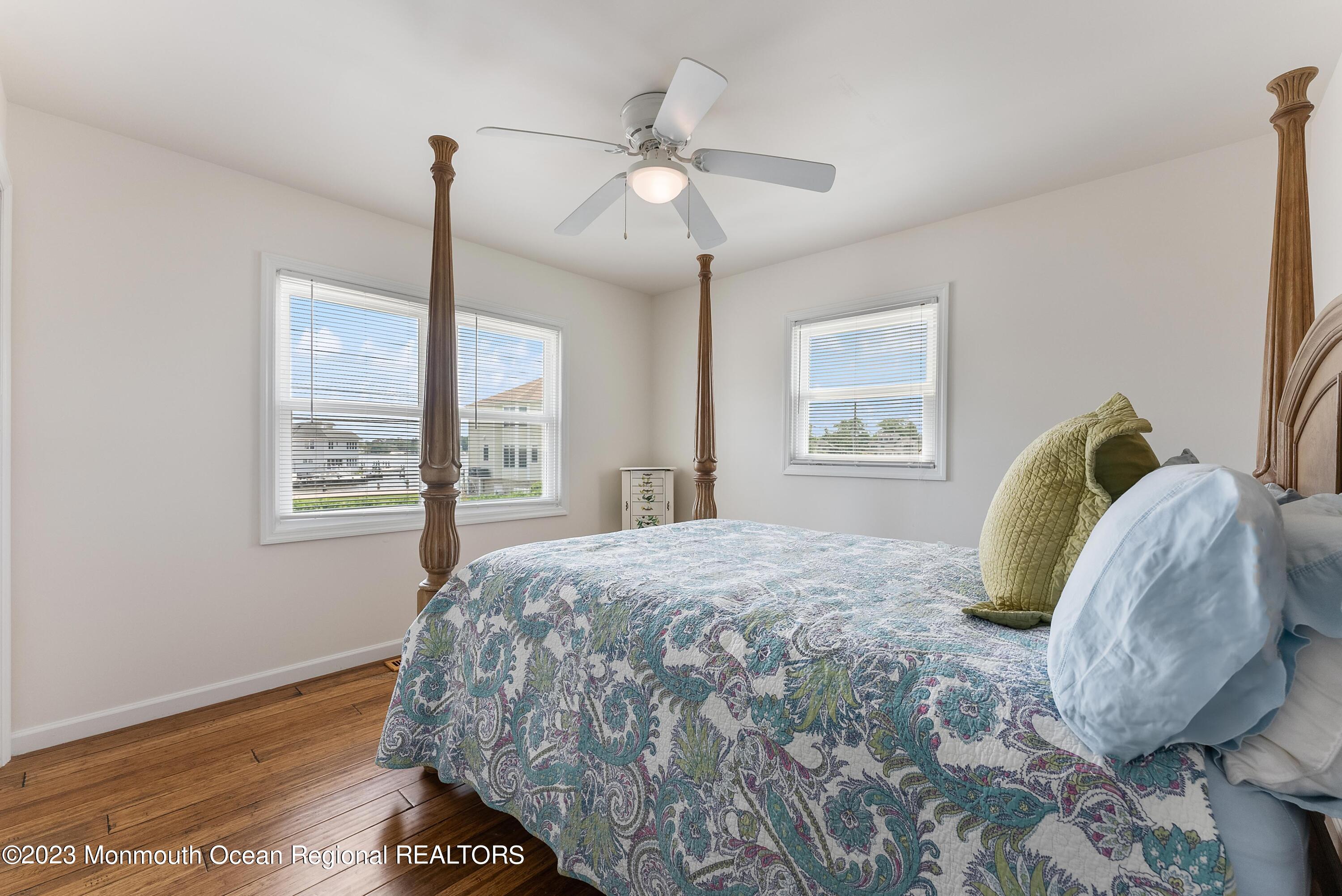 16 Brookfield Drive Brick, NJ 08723 - Photo 16 of 37 a bedroom with a bed and a window
