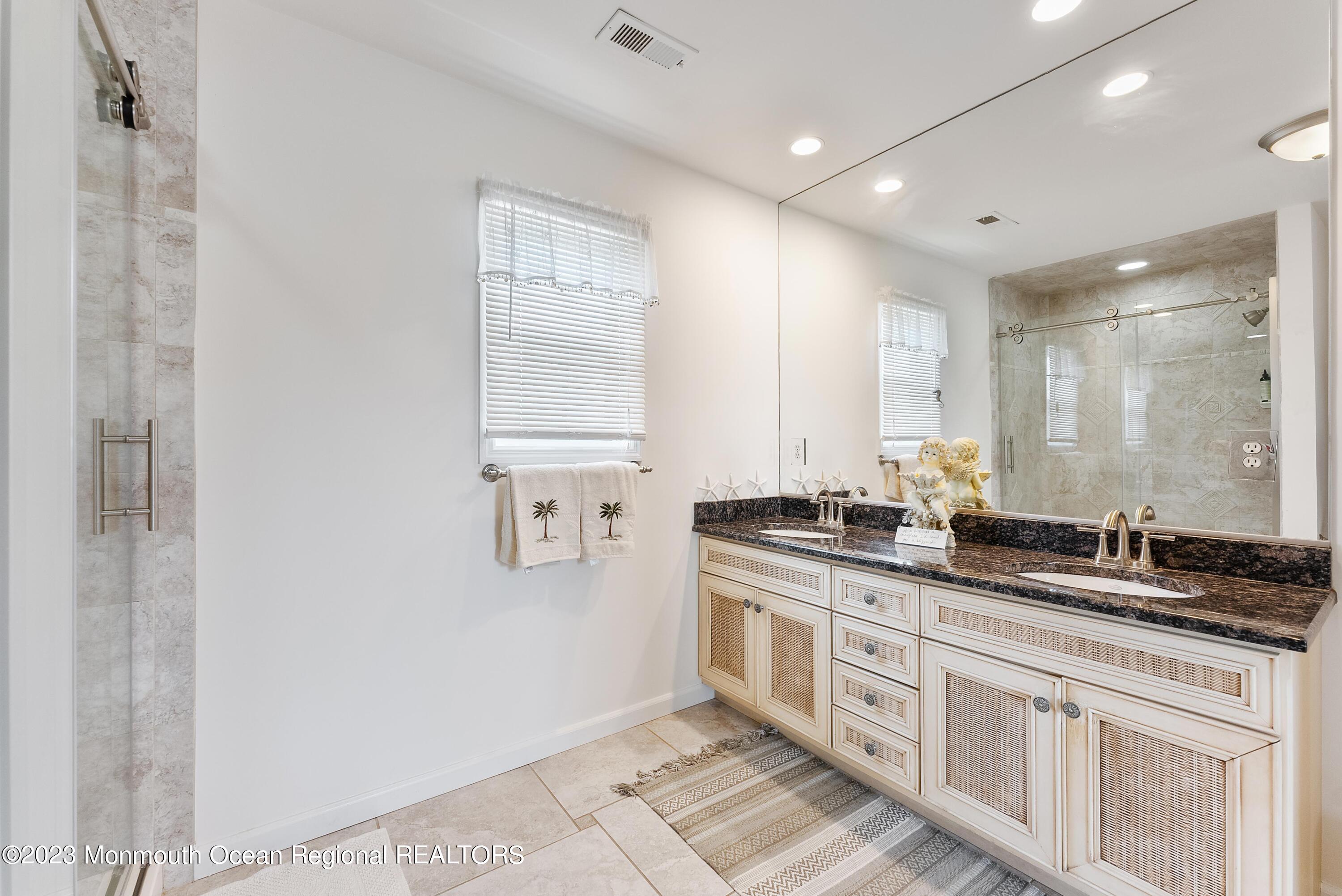 16 Brookfield Drive Brick, NJ 08723 - Photo 21 of 37 a kitchen with stainless steel appliances granite countertop a sink and cabinets