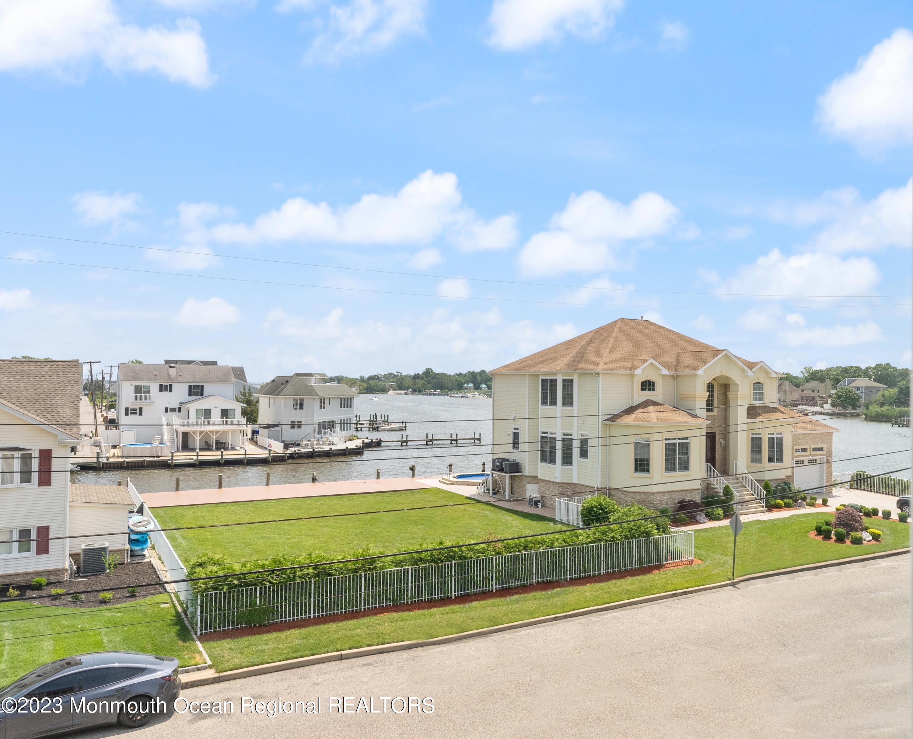 16 Brookfield Drive Brick, NJ 08723 - Photo 22 of 37 a view of a city with tall buildings