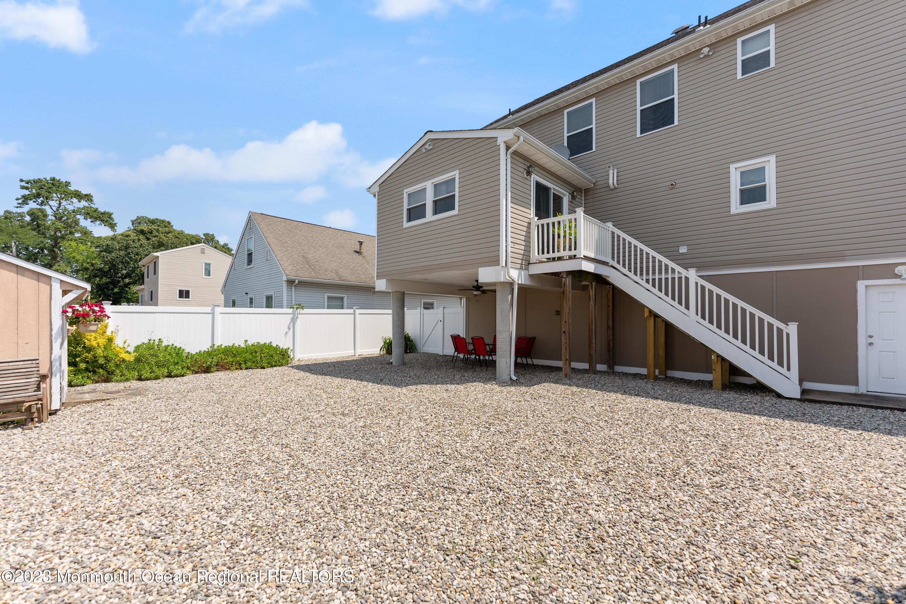 16 Brookfield Drive Brick, NJ 08723 - Photo 28 of 37 a view of a house with a yard