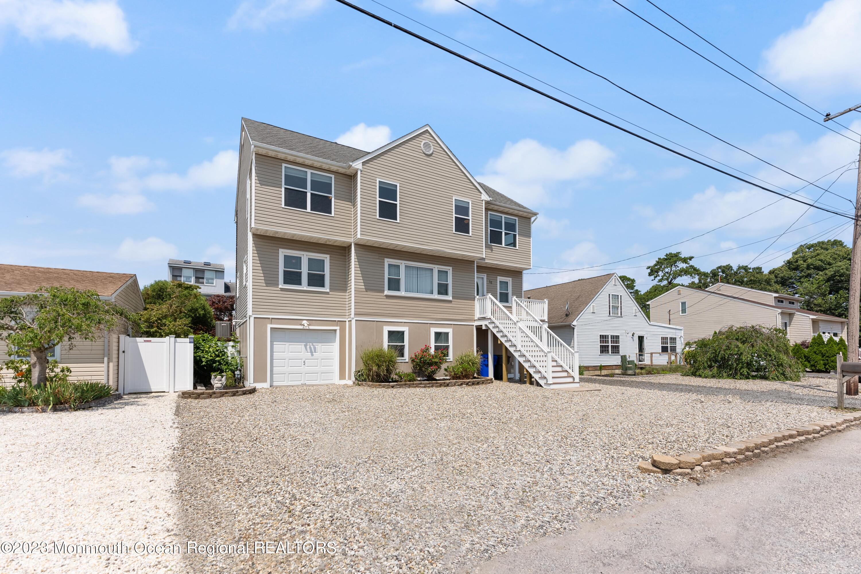 16 Brookfield Drive Brick, NJ 08723 - Photo 3 of 37 a view of multiple houses with a street