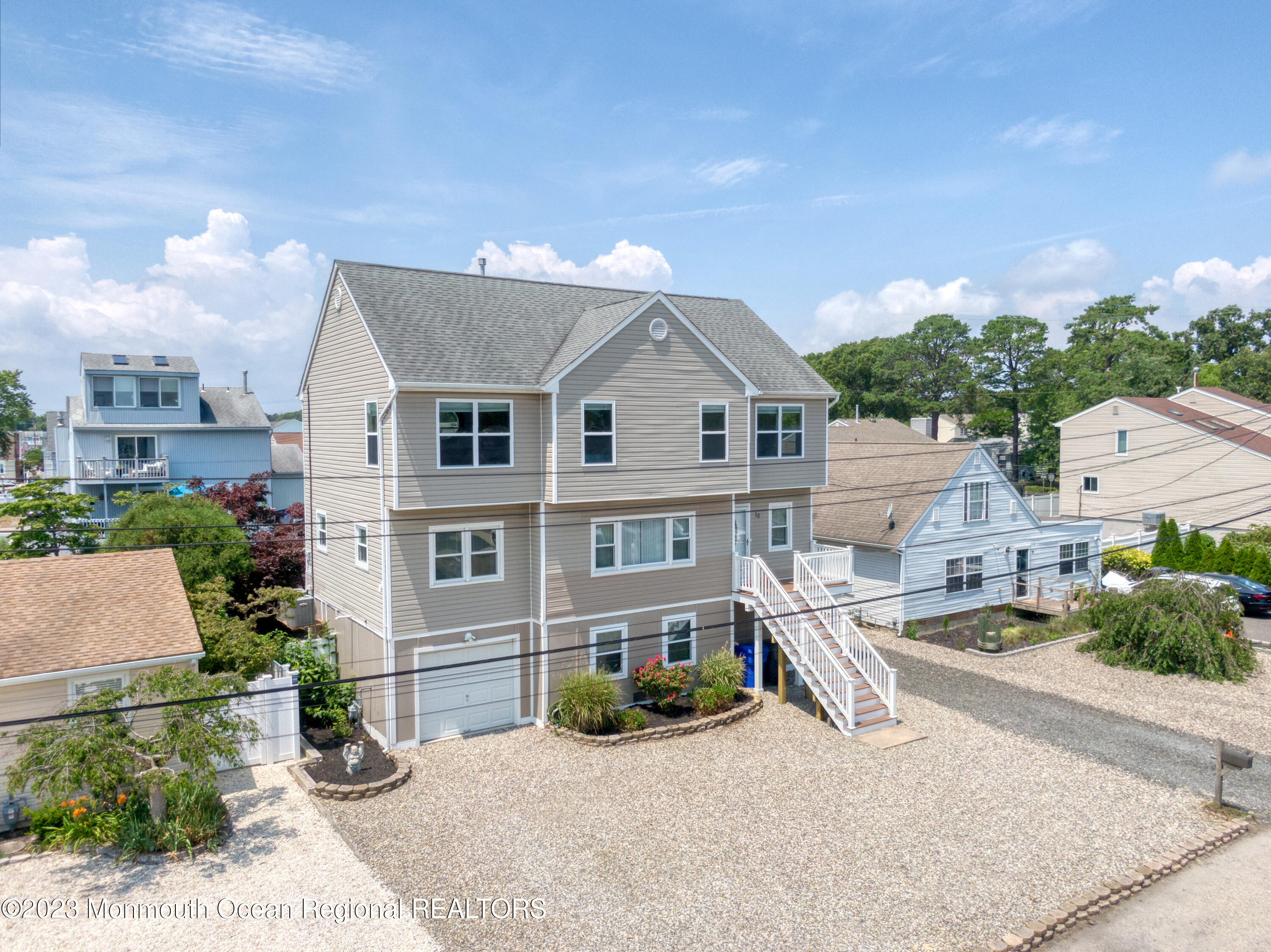 16 Brookfield Drive Brick, NJ 08723 - Photo 31 of 37 an aerial view of a house with basket ball court