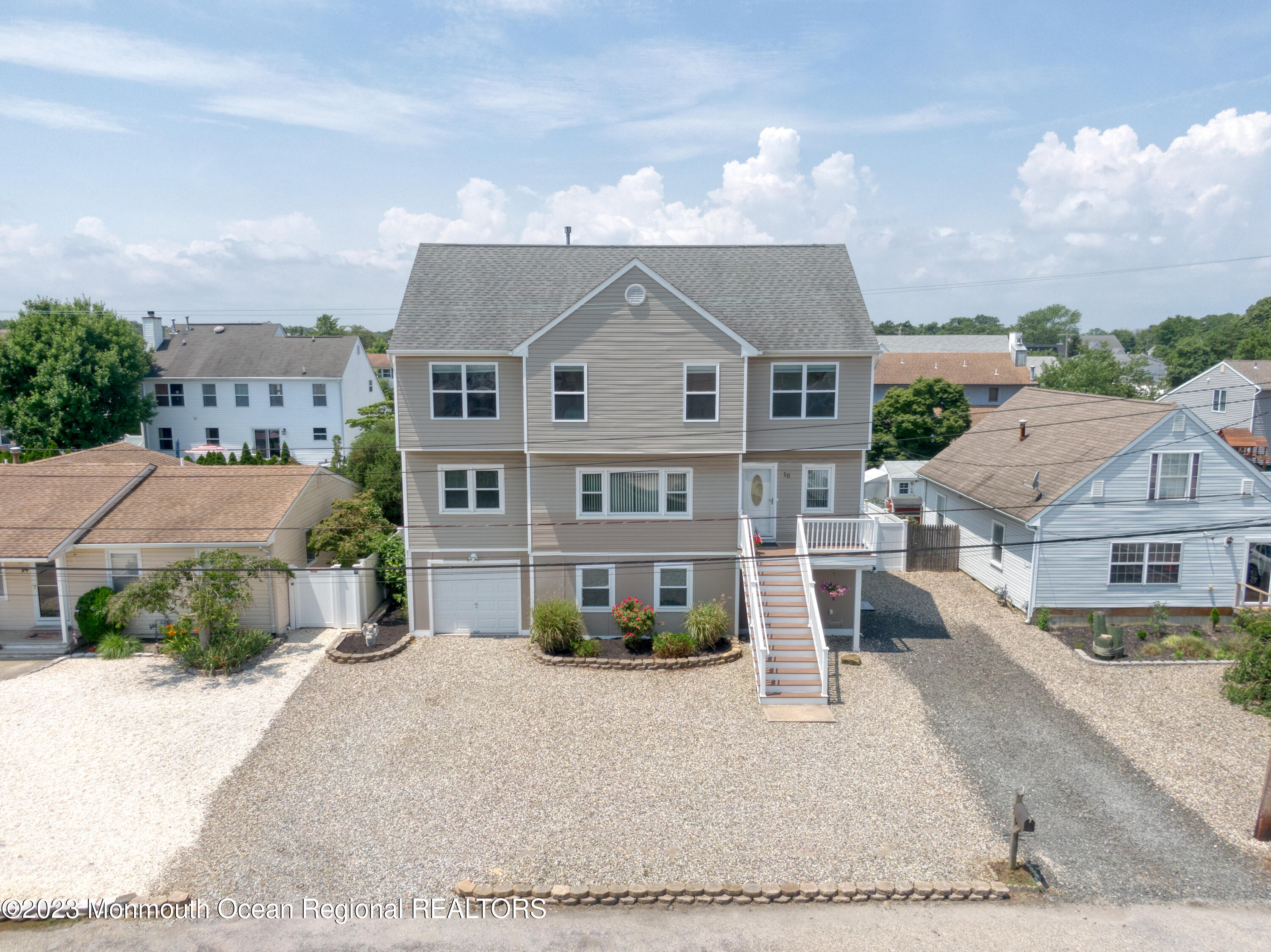 16 Brookfield Drive Brick, NJ 08723 - Photo 32 of 37 a front view of a house with a yard