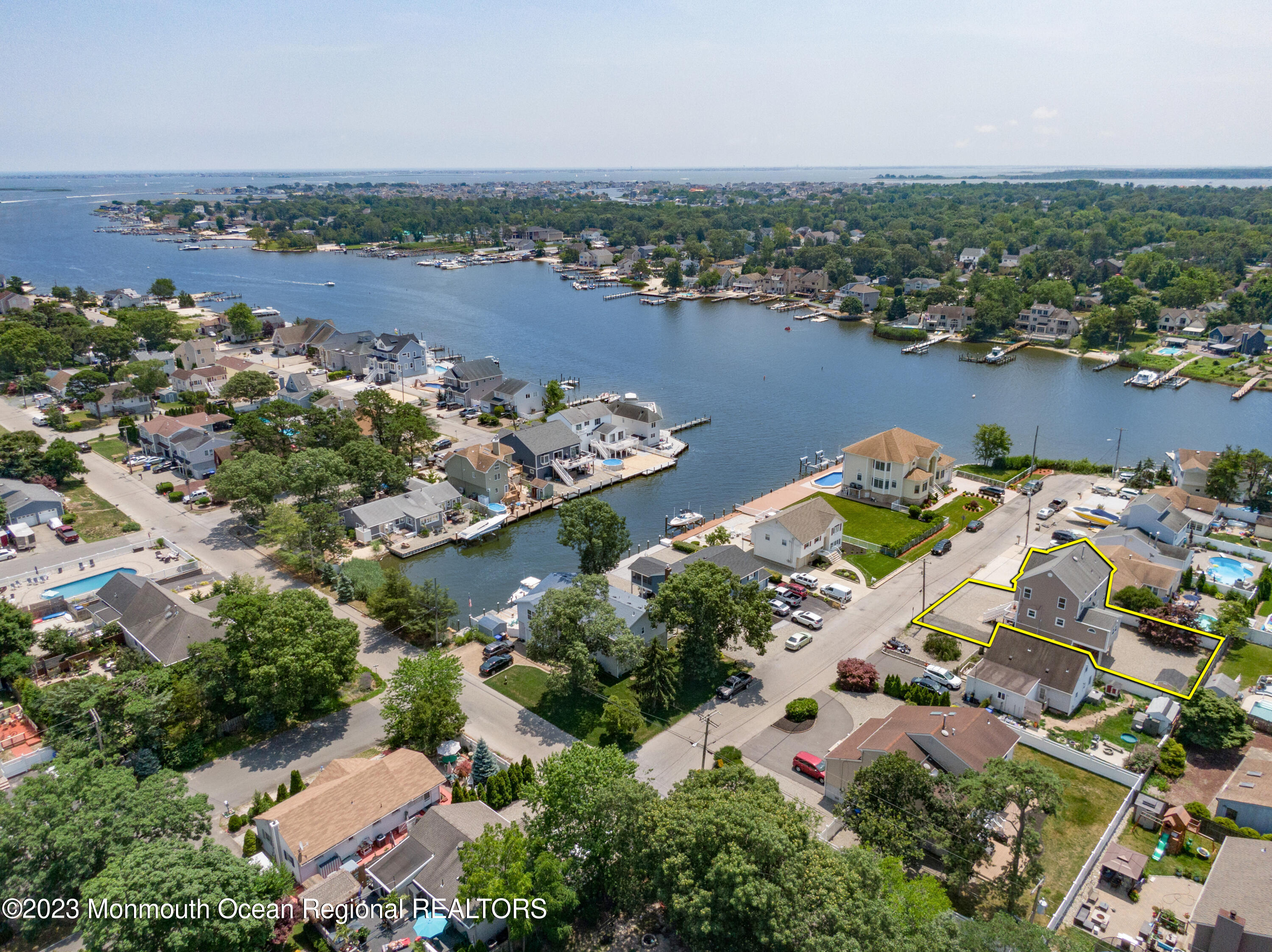 16 Brookfield Drive Brick, NJ 08723 - Photo 36 of 37 an aerial view of lake and residential houses with outdoor space