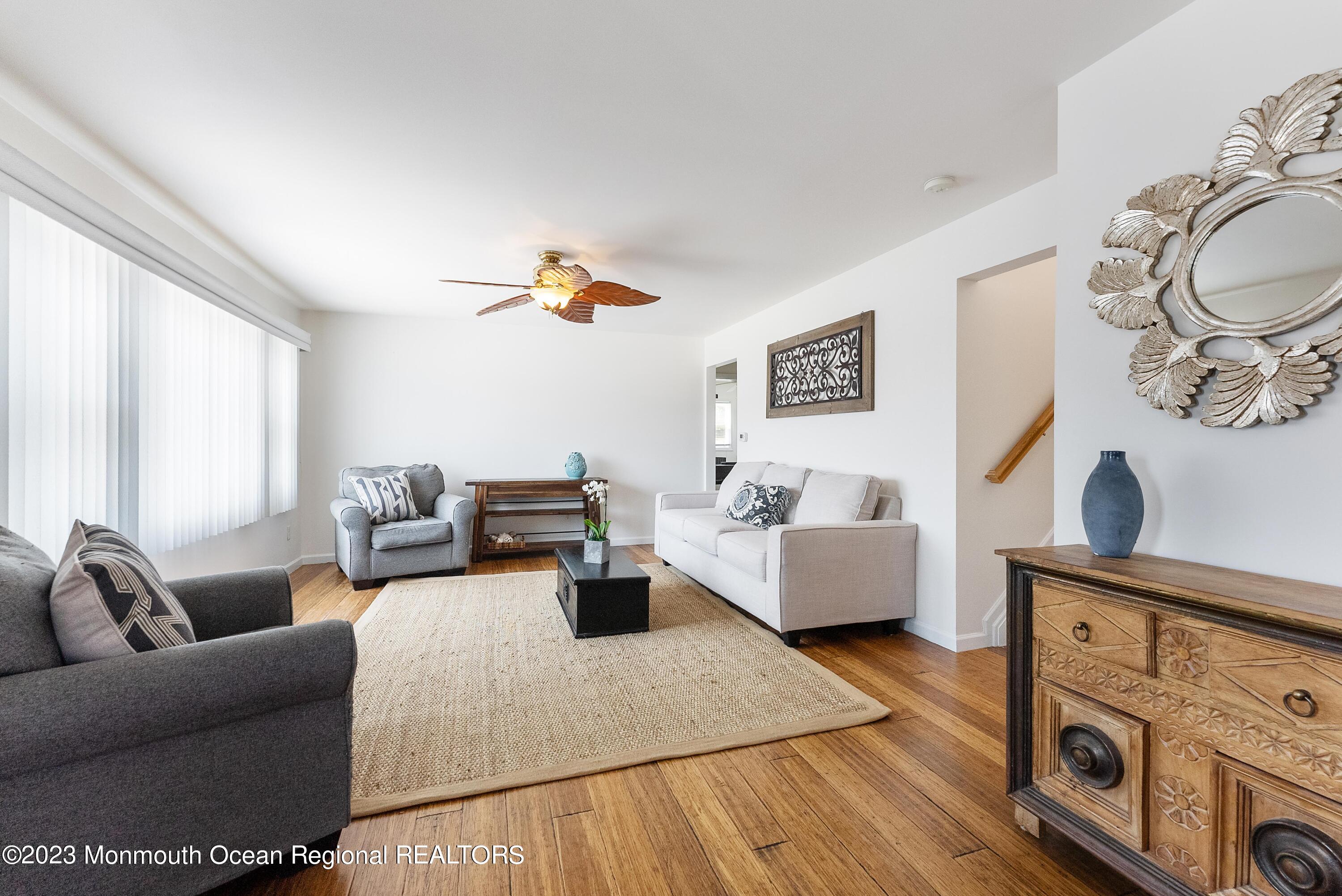 16 Brookfield Drive Brick, NJ 08723 - Photo 7 of 37 a living room with furniture and wooden floor