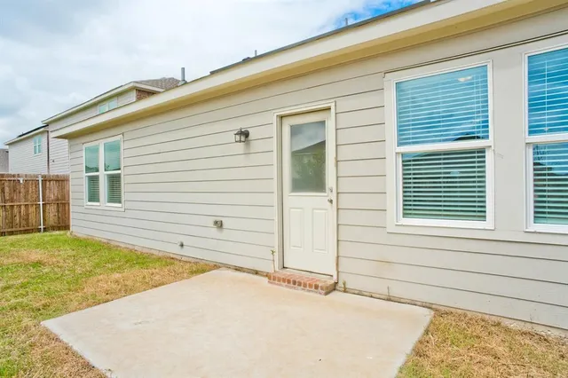 a view of a backyard with a outdoor space