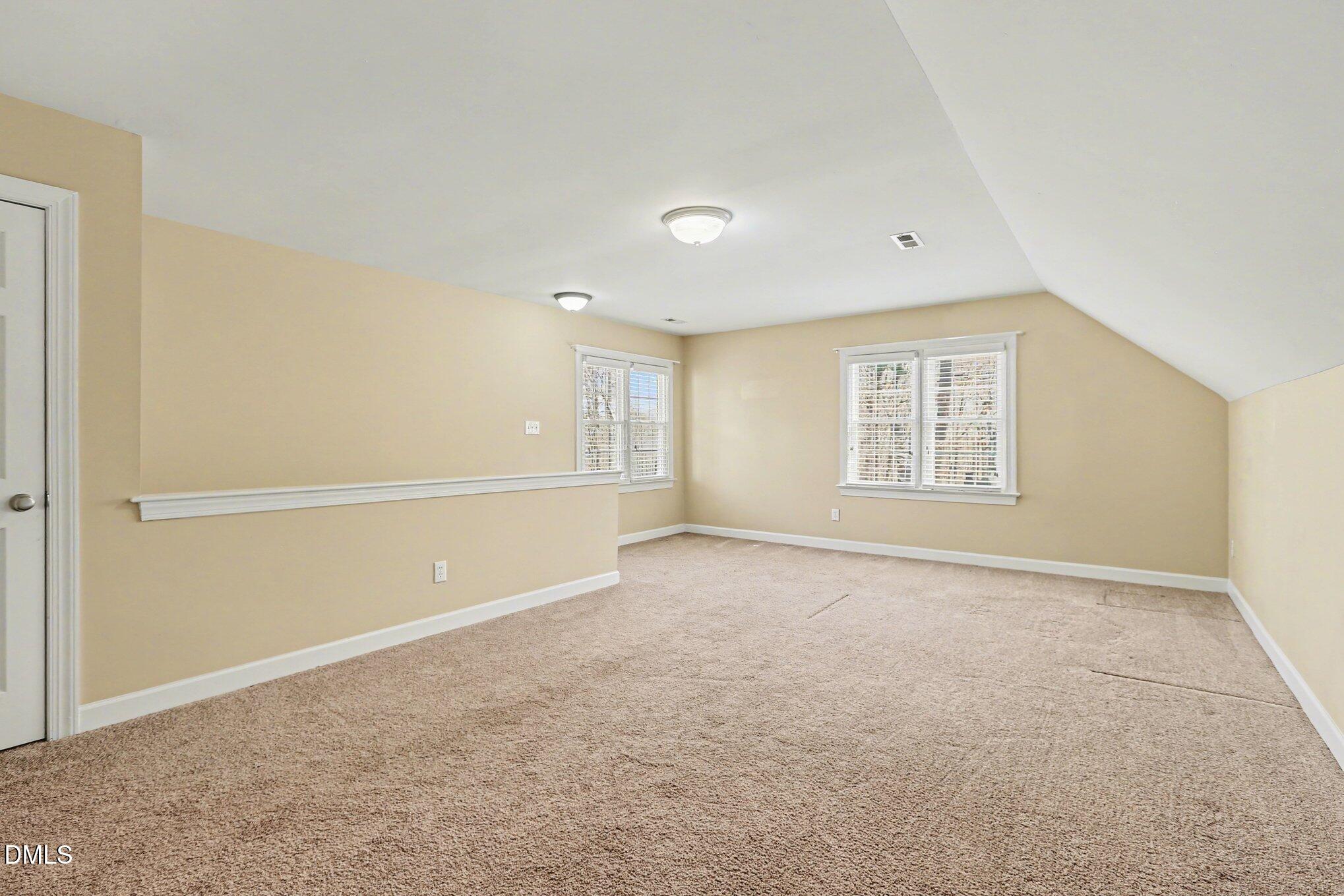 2616 Jasper Lane Raleigh, NC 27613 - Photo 20 of 44 an empty room with windows