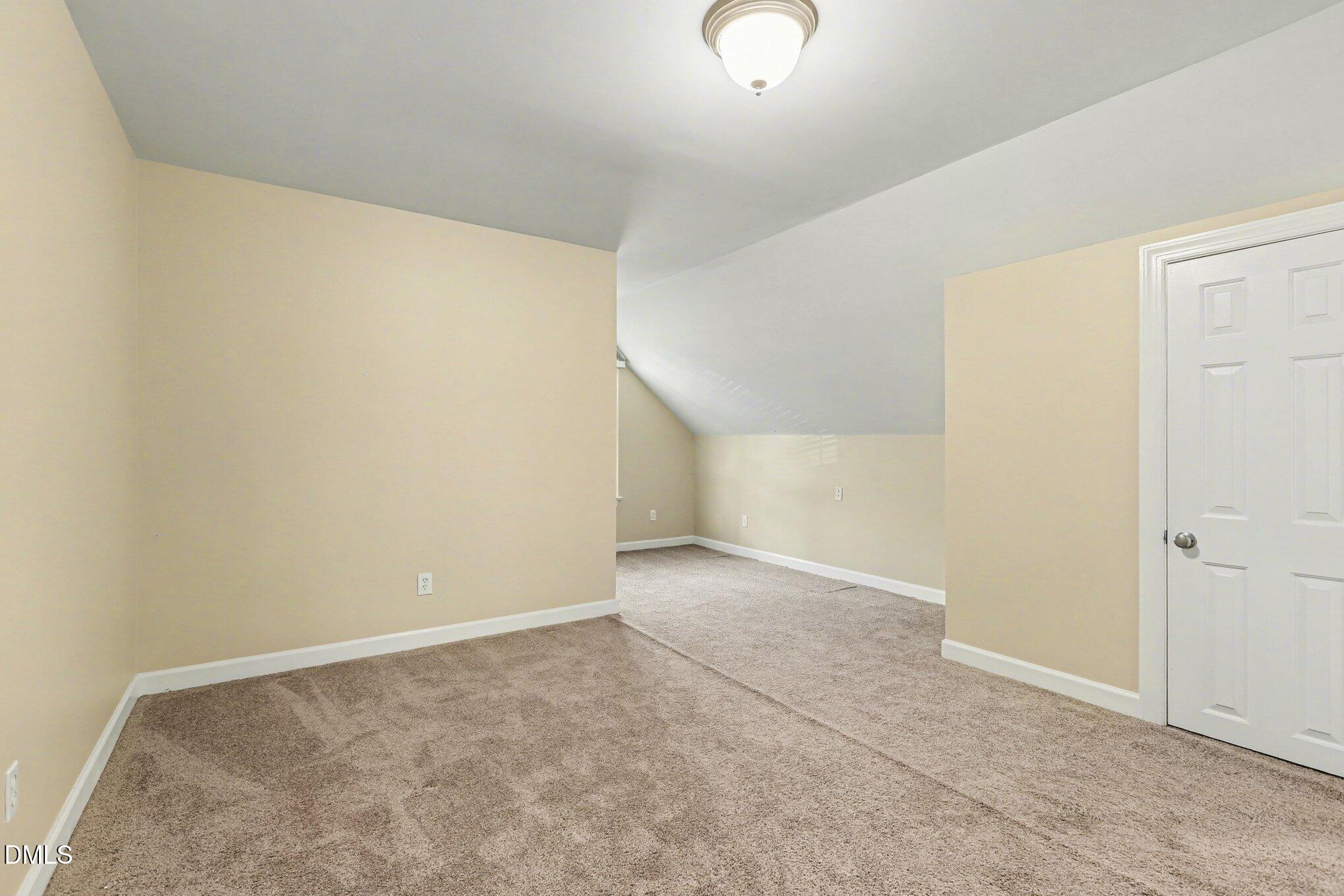 2616 Jasper Lane Raleigh, NC 27613 - Photo 22 of 44 an empty room with a natural light