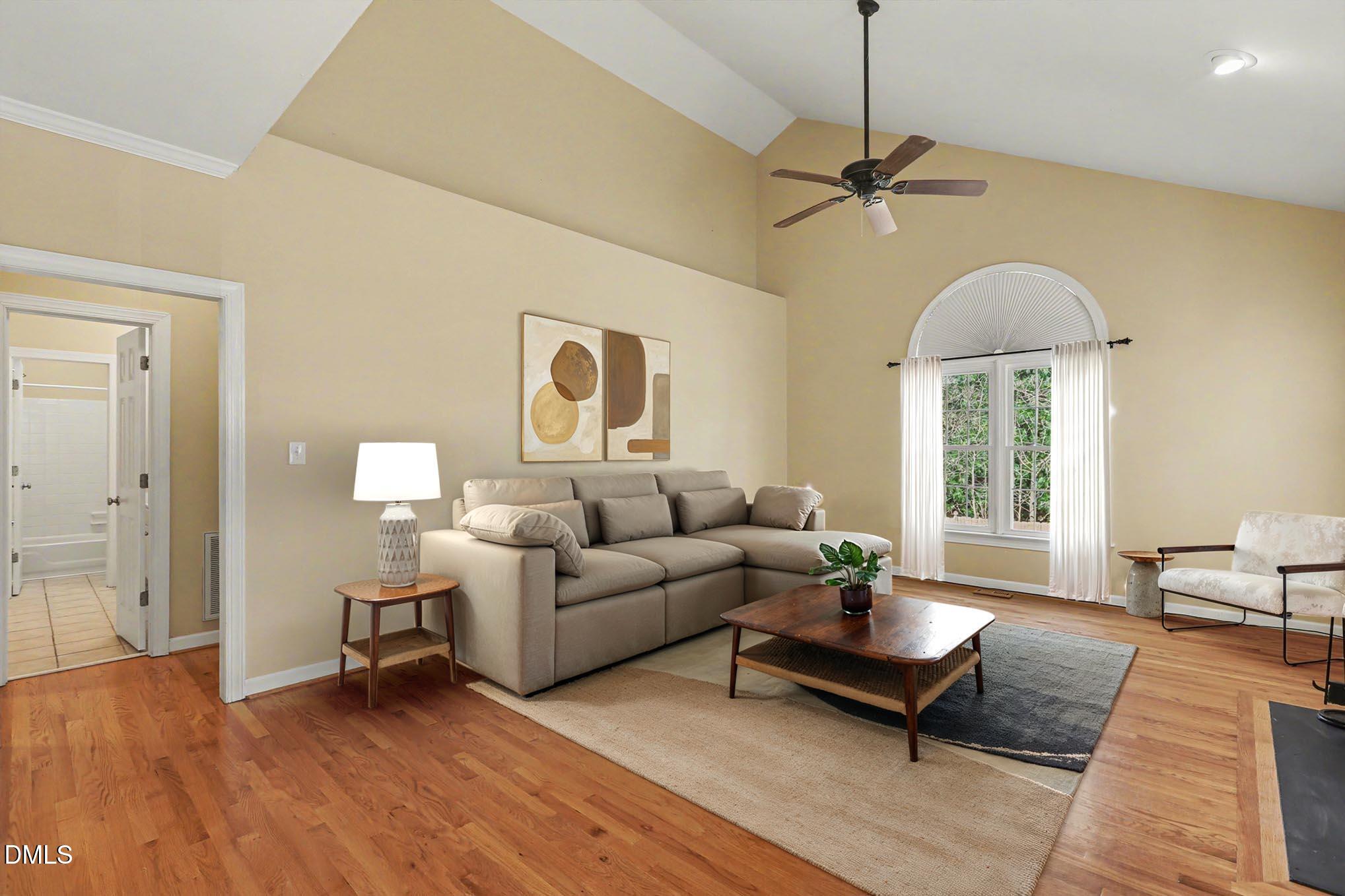 2616 Jasper Lane Raleigh, NC 27613 - Photo 24 of 44 a living room with furniture and a window