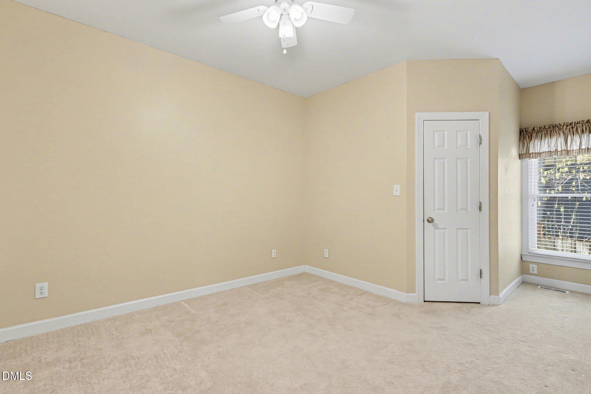 2616 Jasper Lane Raleigh, NC 27613 - Photo 29 of 44 an empty room with a empty space and windows