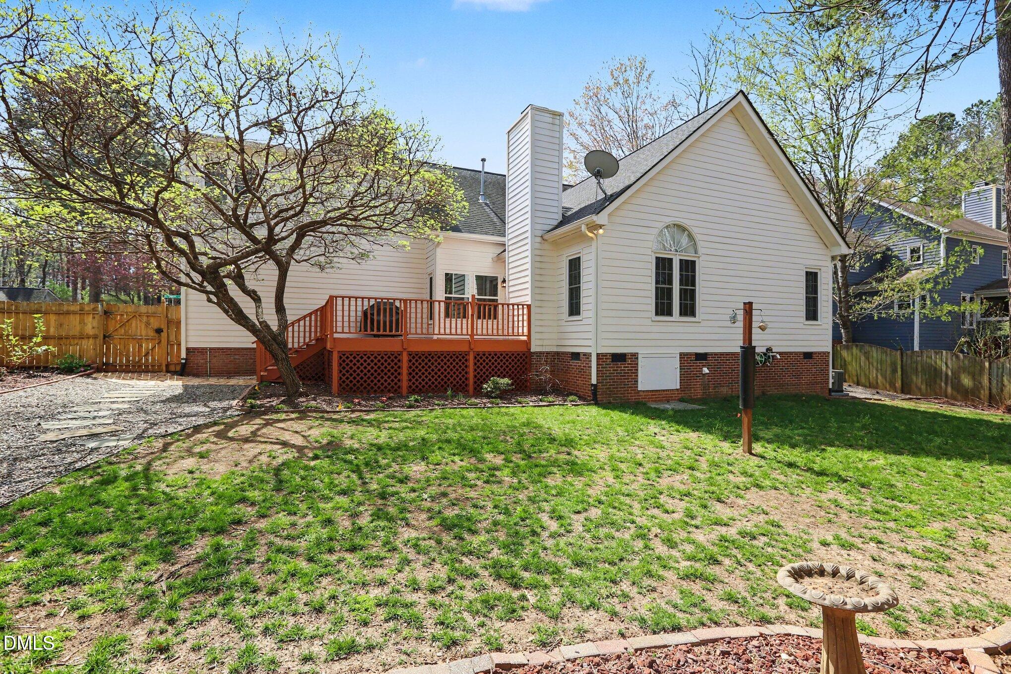 2616 Jasper Lane Raleigh, NC 27613 - Photo 40 of 44 a view of a house with backyard