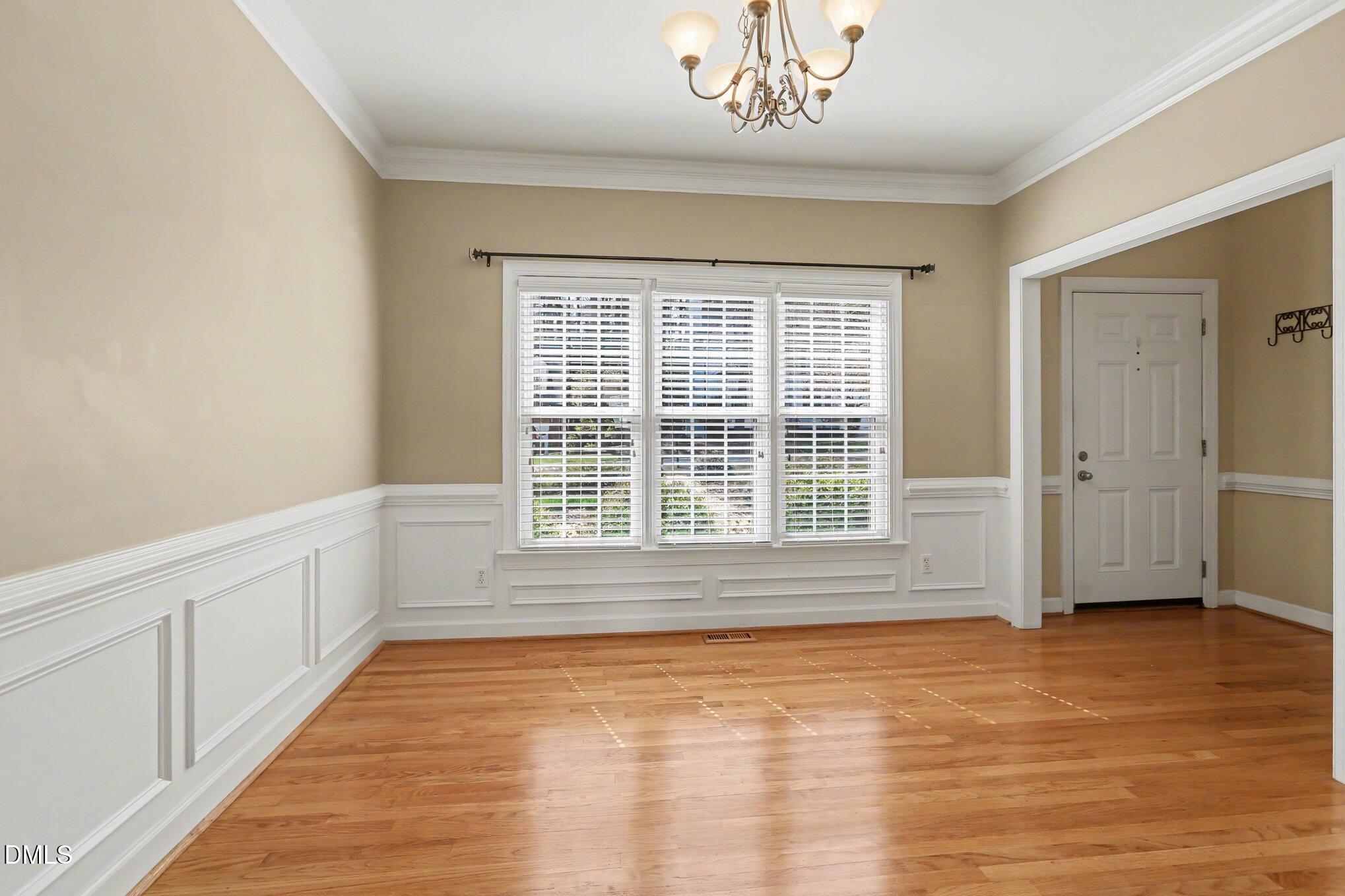 2616 Jasper Lane Raleigh, NC 27613 - Photo 6 of 44 a view of an empty room with a window