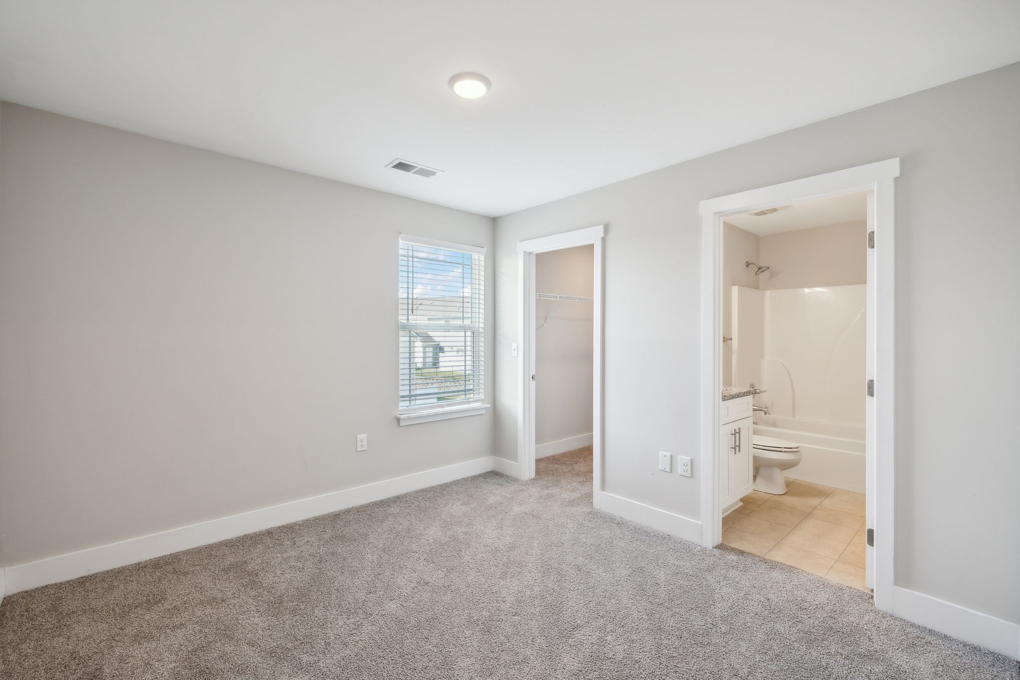 7026 Magnolia Crossings Spring Hill, TN 37174 - Photo 11 of 20 an empty room with windows and closet