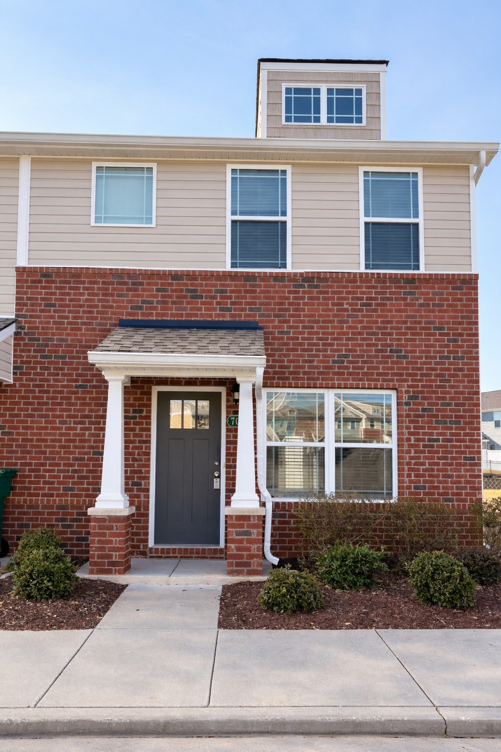 7026 Magnolia Crossings Spring Hill, TN 37174 - Photo 16 of 20 a front view of a house with garden