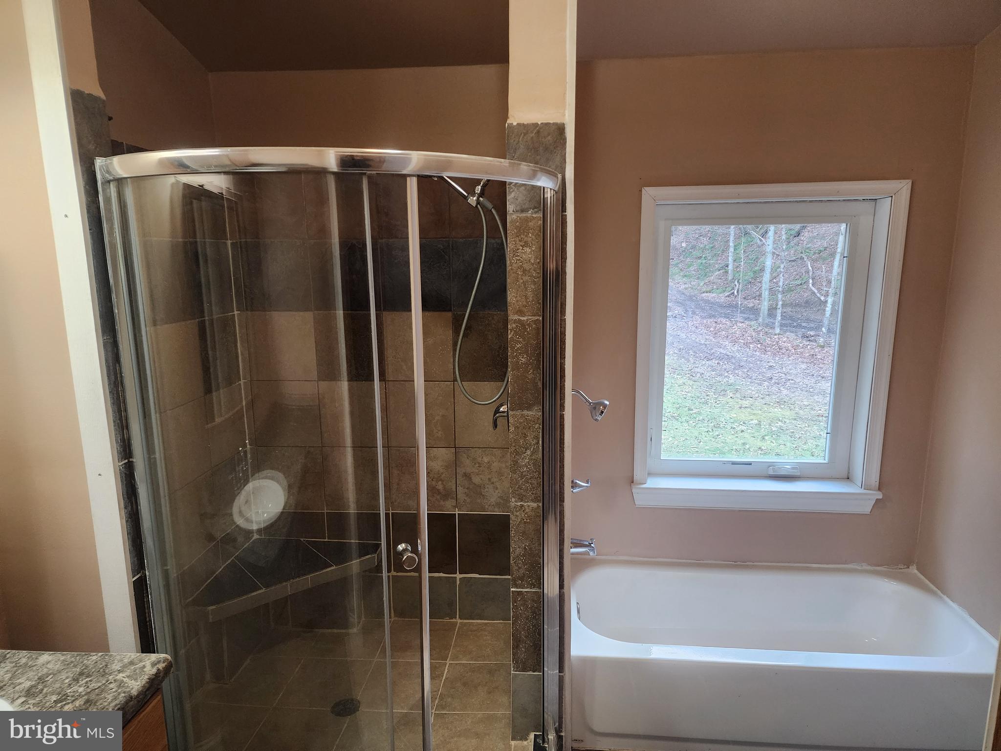 3895 Sugar Run Road Newport, PA 17074 - Photo 22 of 33 3rd Bathroom Shower with Seat and Tub