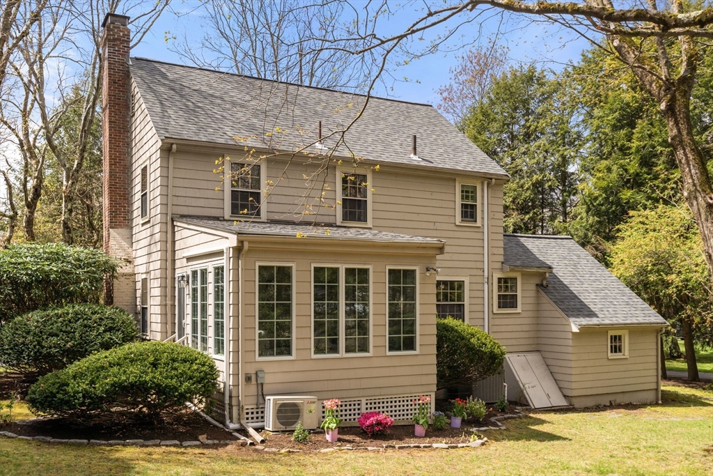 17 Roberts Road Wellesley, MA 02481 - Photo 26 of 34 a front view of a house with a yard